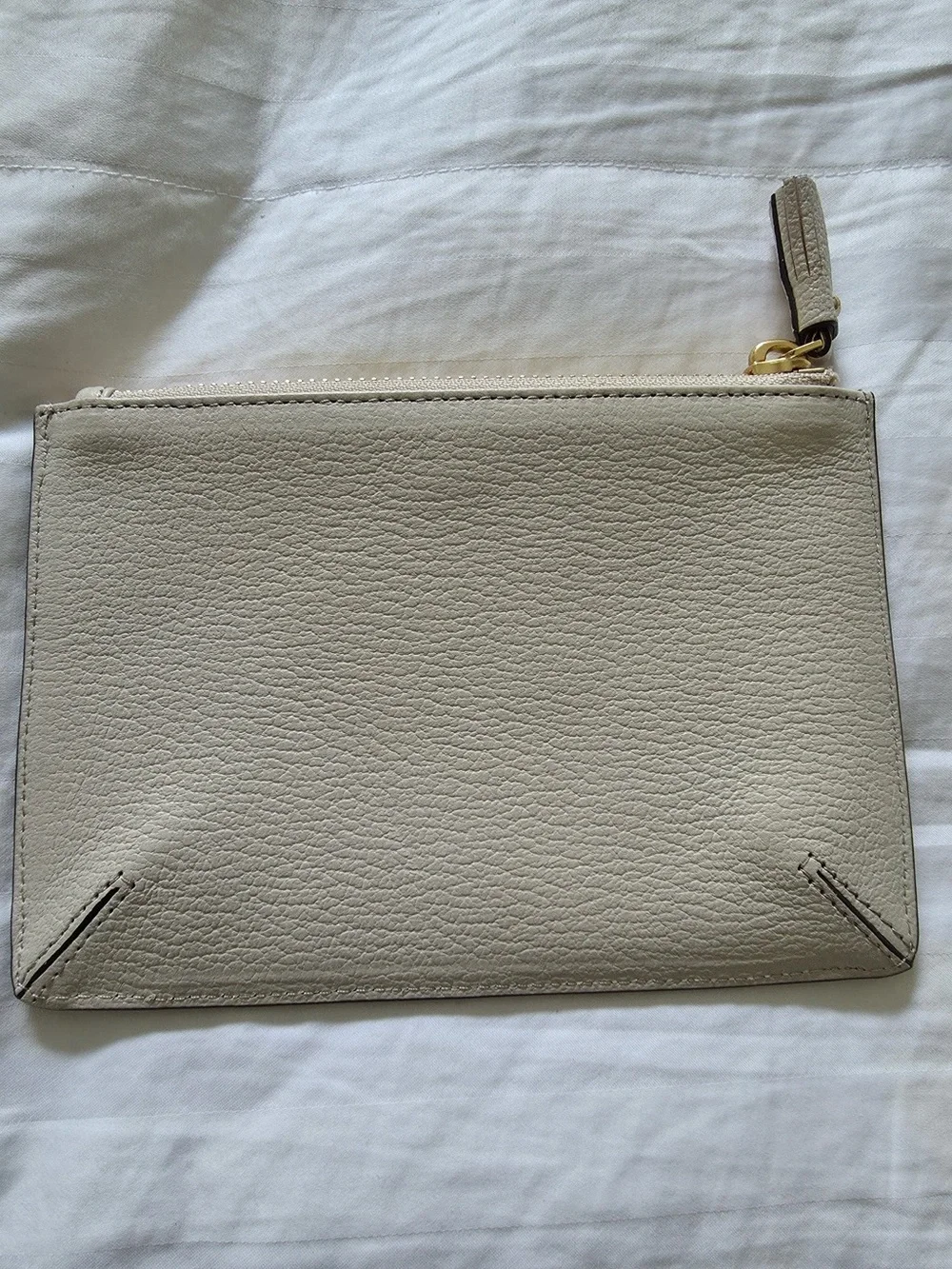 Anya Hindmarch Cream Leather Wristlet Clutch with Red Pixel Alien Motif